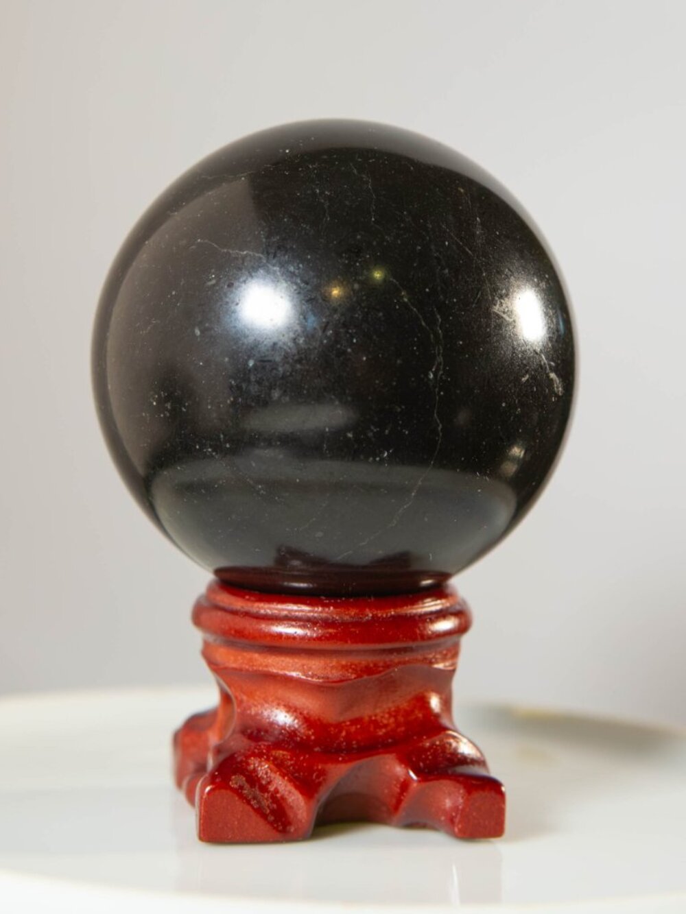 Natural Black Obsidian Crystal Sphere 2" w/ Wooden Stand - Picture 3 of 6